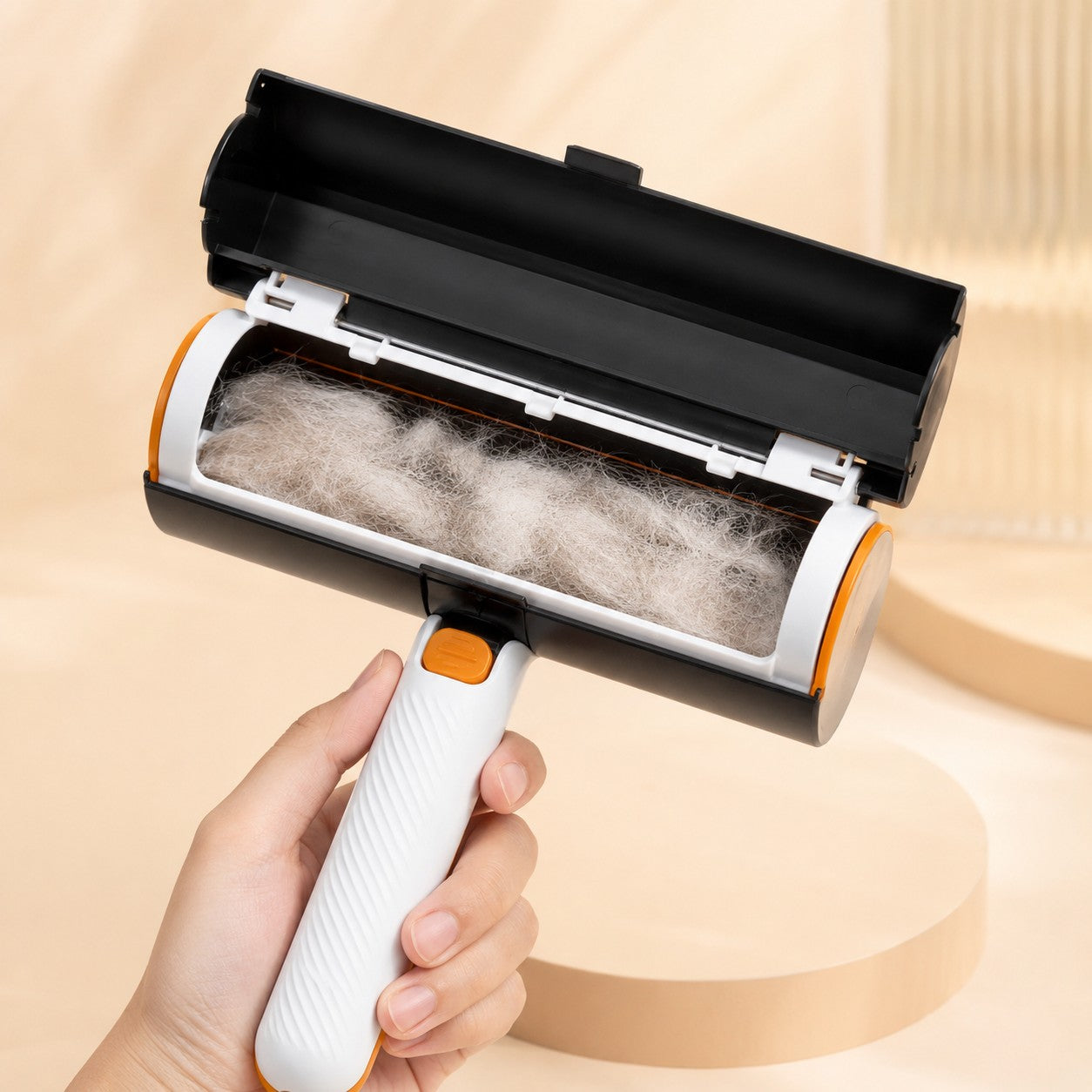 Shedwell pet hair roller with its collection chamber open